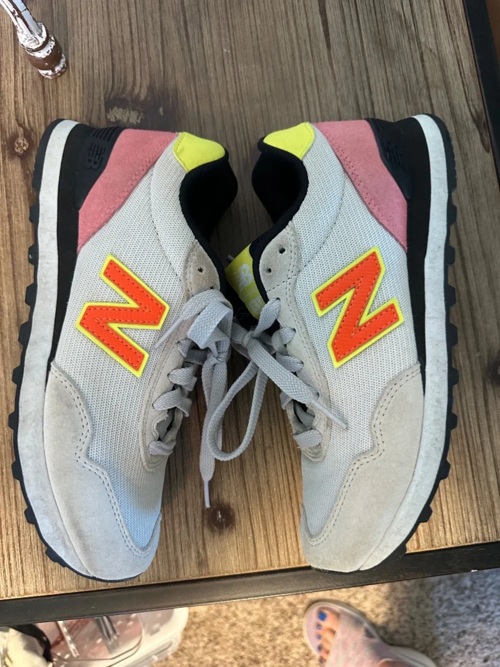 New Balance tennis shoes, gray with yellow and black trim, pink suede, size 7.5